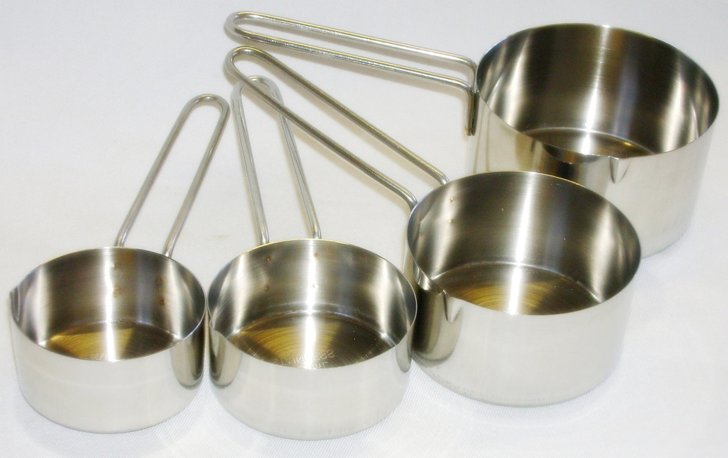 APOLLO STAINLESS STEEL MEASURING CUP SET OF 4. AP9786 \\\KD15596