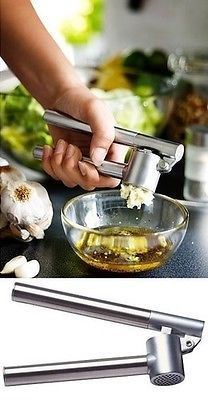 HEAVY DUTY DELUXE STAINLESS STEEL GARLIC PRESS. KONCIS \\\KONCIS